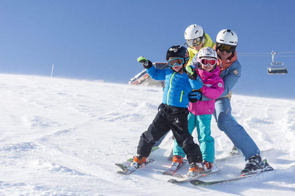 Family skiing on the slope